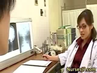 Asian woman doctor handjob