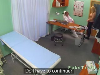 Doctor fucks blonde sales woman in an office